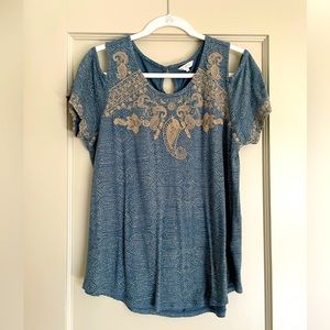 Peekaboo shoulder top